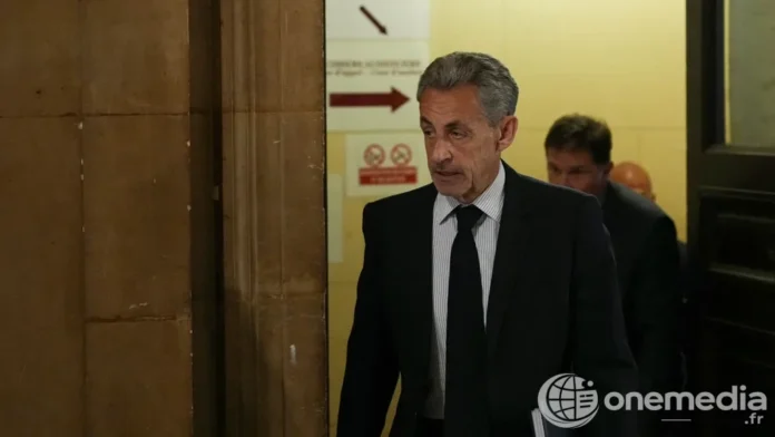 Nicolas Sarkozy arrivant au palais de justice de Paris pendant le procès libyen en appel