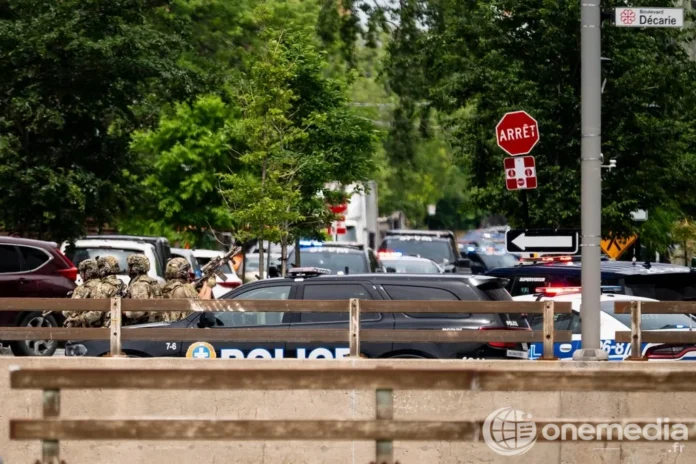 Policiers déployés sur les lieux d'une fusillade dans le quartier Côte-des-Neiges à Montréal, le 22 juin 2026