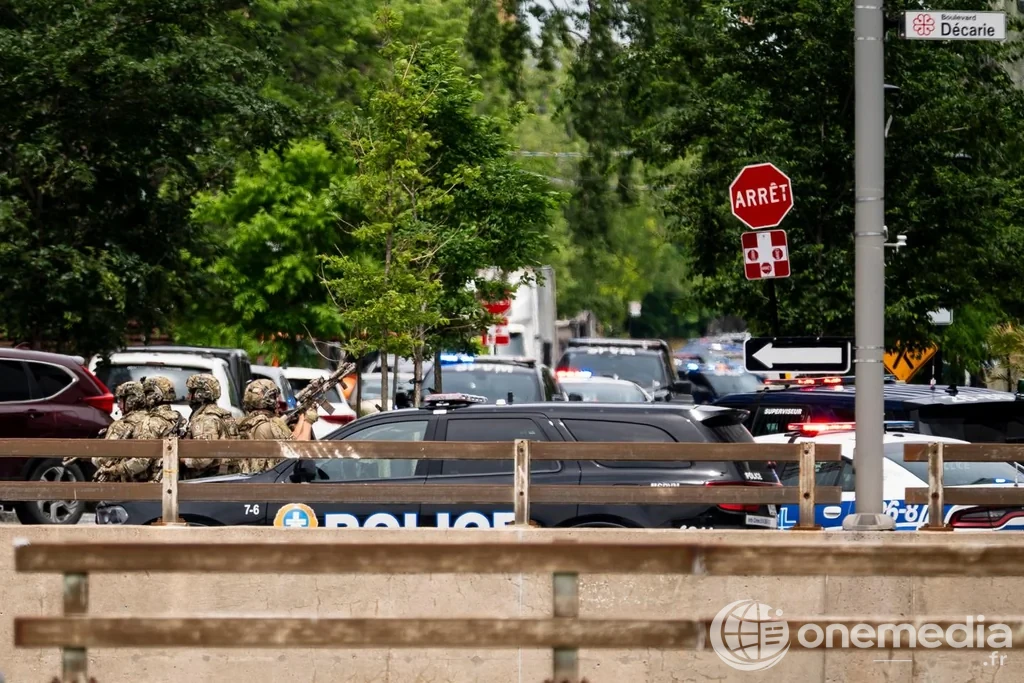 Policiers déployés sur les lieux d'une fusillade dans le quartier Côte-des-Neiges à Montréal, le 22 juin 2026